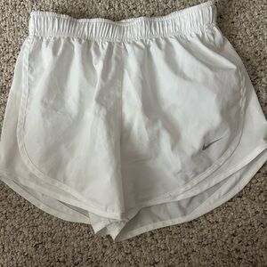 White Nike shorts